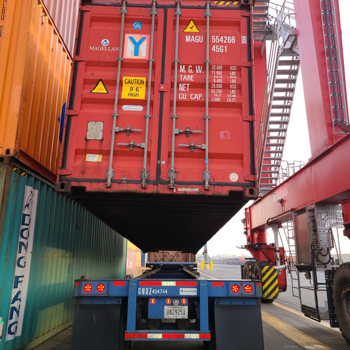 Container being lifted onto a chassis at a Chicago rail ramp